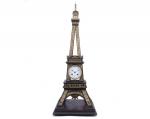 Travail français vers 1900 
Pendule Tour Eiffel 

en bois teinté...