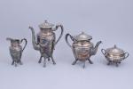 Service à thé-café 

en métal argenté, de quatre pièces, composé...