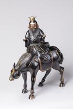 JAPON - début du XXeLao-Tseu sur son âne.Bronze à patine...
