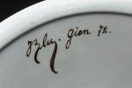 J BLUPorteuse de fagots, 1872.Rare assiette en céramique émaillée à...