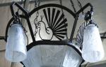 MULLER FRÈRES à LUNÉVILLE vers 1920-1940
Grand lustre aux paons

en fer...