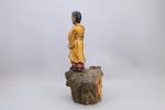 Chine, vers 1900.
Groupe sur un rocher

en bois sculpté et partiellement...