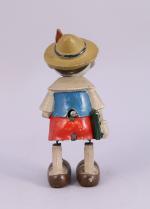 Les jouets créations 

Pinocchio, matériau composite laqué polychrome. 

Haut. 20,5...