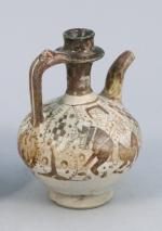 Iran Seldjoukide, XIIe-XIIIe siècleAiguière en céramique siliceuse, à décor de...