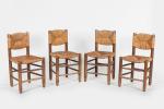 Charlotte Perriand (Française, 1903-1999)Sept chaises, c. 1947en bois massif et...