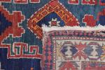 CaucaseTapis  en laine à fond bleu, décor de trois...