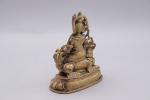 Tibet - Début XXe siècle
Statuette de Jambhala 

en bronze doré,...