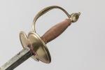 Epée d’officier modèle 1767 

Pommeau en olive rainuré. Garde à...