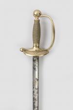 Epée d’officier subalterne, modèle 1816 

Fusée filigranée de laiton. Pommeau...