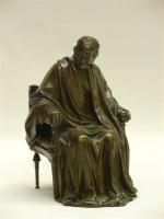 HOUDON, d'après."Voltaire assis". Bronze à patine mordorée. Haut. 18 cm.