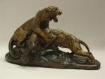 DROUOT Édouard (1859-1945).Tigres luttant. Bronze à patine dorée et brune....