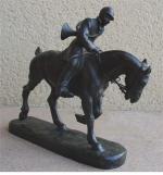 d'ILLIERS Gaston (1876-1952)Piqueux. Bronze à patine médaille. Signé en terrasse....