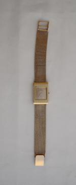 MONTRE-BRACELET d'homme en or jaune dite "diamanté", la montre rectangulaire,...