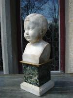 Pierre JULIEN (1731 - 1804).BUSTE de jeune garçon.Sculpture en marbre...