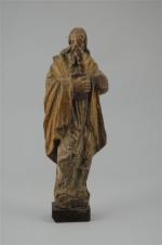 STATUETTE représentant un philosophe (?) en bois sculpté. Homme barbu...