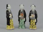 CHINE ou JAPON. TROIS STATUETTES en porcelaine polychrome et ot...