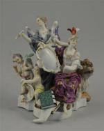 MEISSEN. GROUPE en porcelaine polychrome et or représentant deux figures...