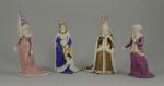 VARIA. Quatre SUJETS en porcelaine polychrome peinte représentant des DAMES...