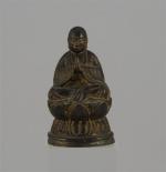 LOT comprenant : un BOUDDHA en bronze. Probablement Corée, période...