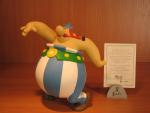 "Asterix"OBÉLIX DANSEUR.Résine. Figurine Leblon-Delienne. Certificat n°2838 / 3000, année 1997.Dans...