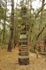Roger CHOMEAUX, dit CHOMO (1907-1999)Le grand totem, quatre masquesSculpture en...