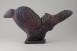 Roger CHOMEAUX, dit CHOMO (1907-1999)OiseauSculpture en siporex à patine rougeHaut....