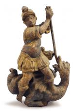 SAINT-GEORGES terrassant le dragon. Statuette en bois sculpté, avec restes...
