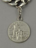 Médaille "St-Christophe protège le droit" montée sur un bracelet maille...