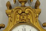GARNITURE DE STYLE LOUIS XV en bronze doré comprenant un...
