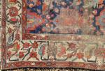 TAPIS d'Iran en laine, à motifs floraux stylisés. 320 x...