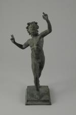 BACCHUS dansant. Travail en composition inspiré de l'Antiquité.Haut. 31,5 cm.