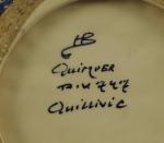 QUIMPER. René QUILLIVIC (1879-1969). Plat rond en faïence polychrome décoré...