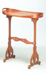 Émile GALLE. 
Table de salon, de forme ovale en noyer...