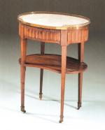 TABLE DE SALON de forme ovale, en bois de placage...