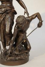 Jules-Félix COUTAN (1848 - 1939).Couple de pêcheurs.Bronze à patine brune....