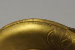 F. BARBEDIENNE.COUPE de forme circulaire en bronze ciselé et doré....