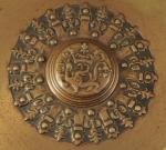 COUPE A OREILLES circulaire en bronze pâtiné, formant plateau et...