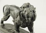 D'après Édouard Paul DELABRIERRE (1829-1912).Lion marchantBronze à patine bruneHaut. 19,...
