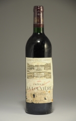 PESSAC-LÉOGNAN - Château Lalouvière - 1990 - 1 bouteille.
Étiquette abîmée...