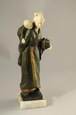 WIHTE H.M. (XIXe-XXe)Japonaise à l'enfant. Sculpture chryséléphantine en bronze polychrome...