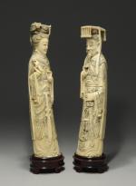 COUPLE IMPÉRIAL, deux statuettes en ivoire sculpté.Haut. 25 cm.Première moitié...