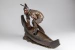 Carl KAUBA (Vienne, 1865-1922)Indien au canoë.Bronze à triple patine, rouge,...