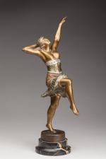 Henry FUGÈRE (1872-1944). Danseuse orientale.Bronze à patine dorée et vert...