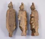 TROIS STATUETTES en bois sculpté stuqué et doré, provenant d'un...