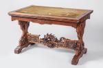 Gabriel VIARDOT (Paris, 1830-1906).
TABLE DE BIBLIOTHÈQUE en bois exotique sculpté...