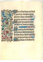Fragment de manuscrit (livre d'heures) chargé de grotesque en marge...