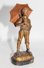 Georges OMERTH (act.1895-1925)
Poulbot au parapluie.
Bronze à patine doré signé "Omerth".
Haut....