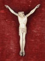 CHRIST en os sculpté monté dans un cadre moderne sur...