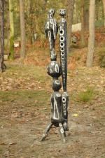 CHOMO, Roger CHOMEAUX, dit (Berlaimont, 1907 - Achères-la-Forêt, 1999).Totem tripode.Sculpture...