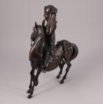 CHINE - XIX-XXe. Cavalier sur sa monture. Bronze.
Haut. 41 cm....